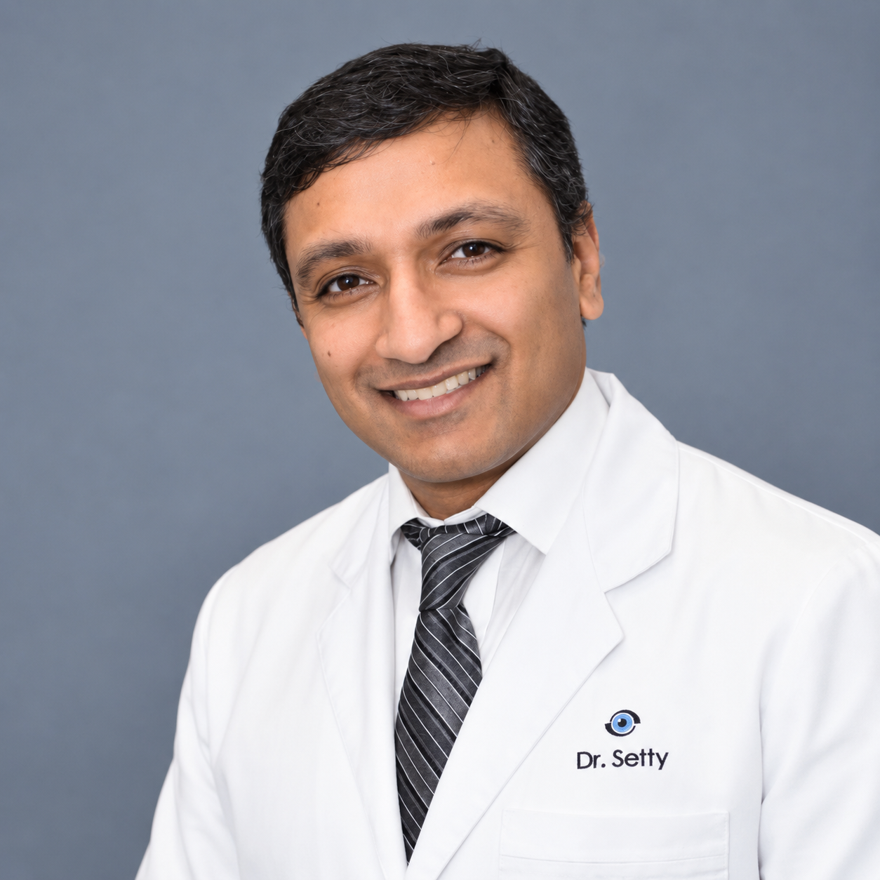 Professional Medical Headshot with Embroidered Lab Coat